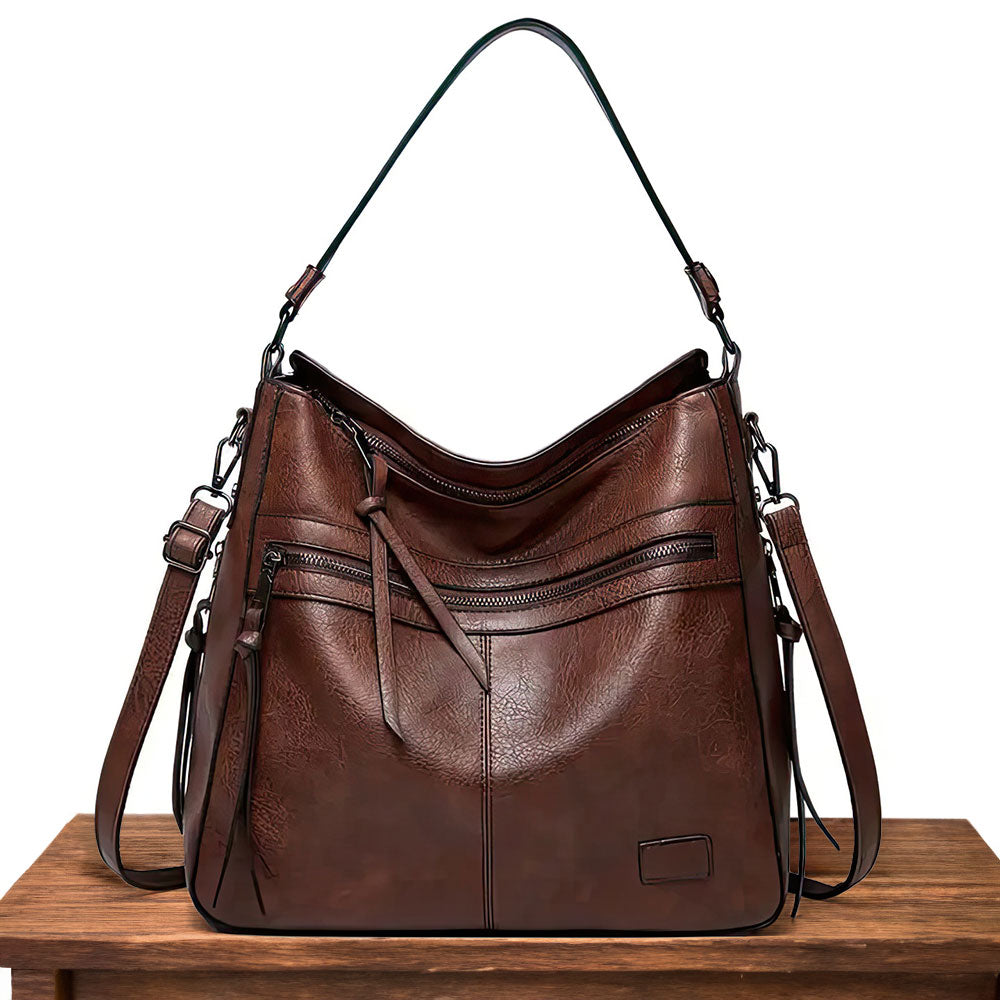 Ángela | Bolso de piel con solapa y correa ajustable