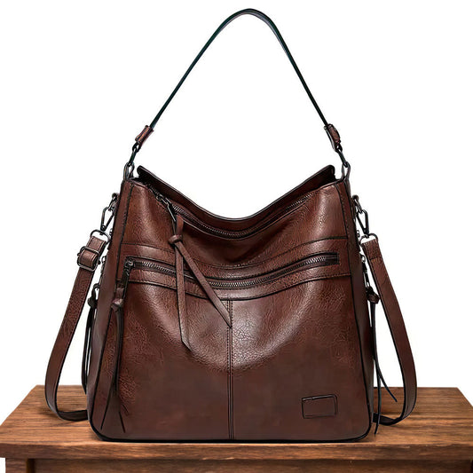 Ángela | Bolso de piel con solapa y correa ajustable
