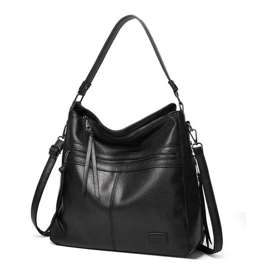 Ángela | Bolso de piel con solapa y correa ajustable