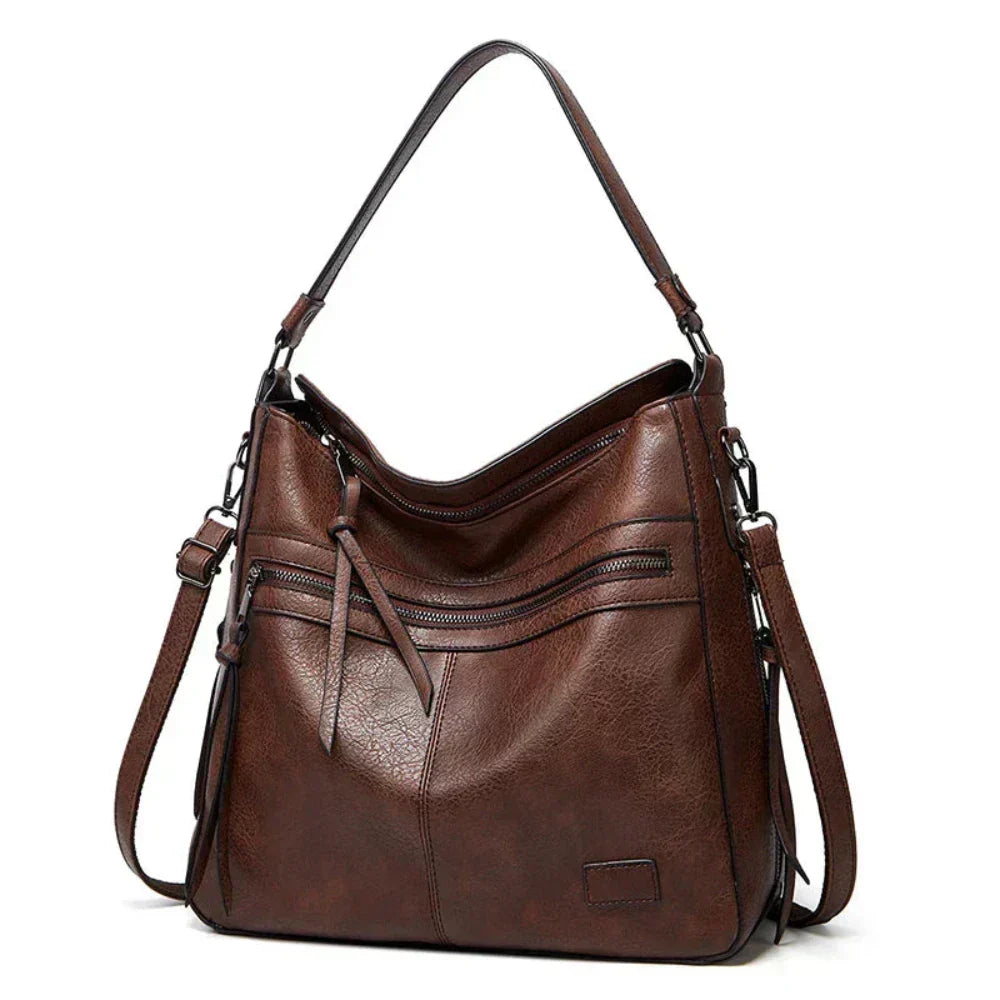 Ángela | Bolso de piel con solapa y correa ajustable