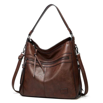 Ángela | Bolso de piel con solapa y correa ajustable