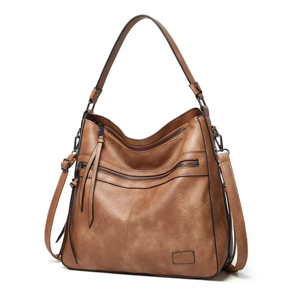 Ángela | Bolso de piel con solapa y correa ajustable