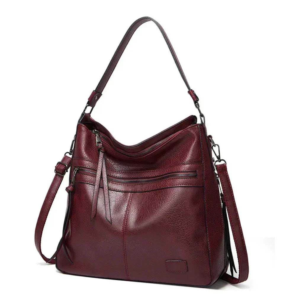 Ángela | Bolso de piel con solapa y correa ajustable