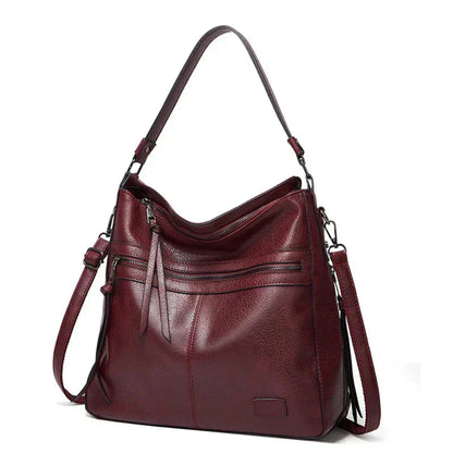 Ángela | Bolso de piel con solapa y correa ajustable